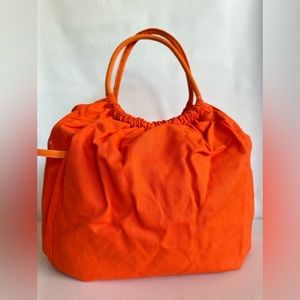 NWOT. Shiseido Large Tangerine Canvas Tote